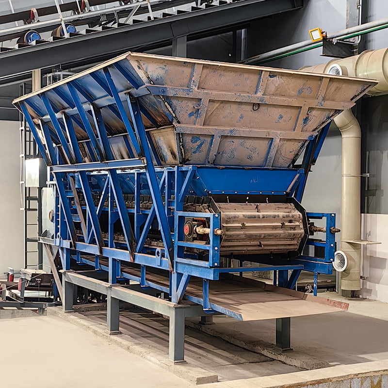 Alimentador de delantal